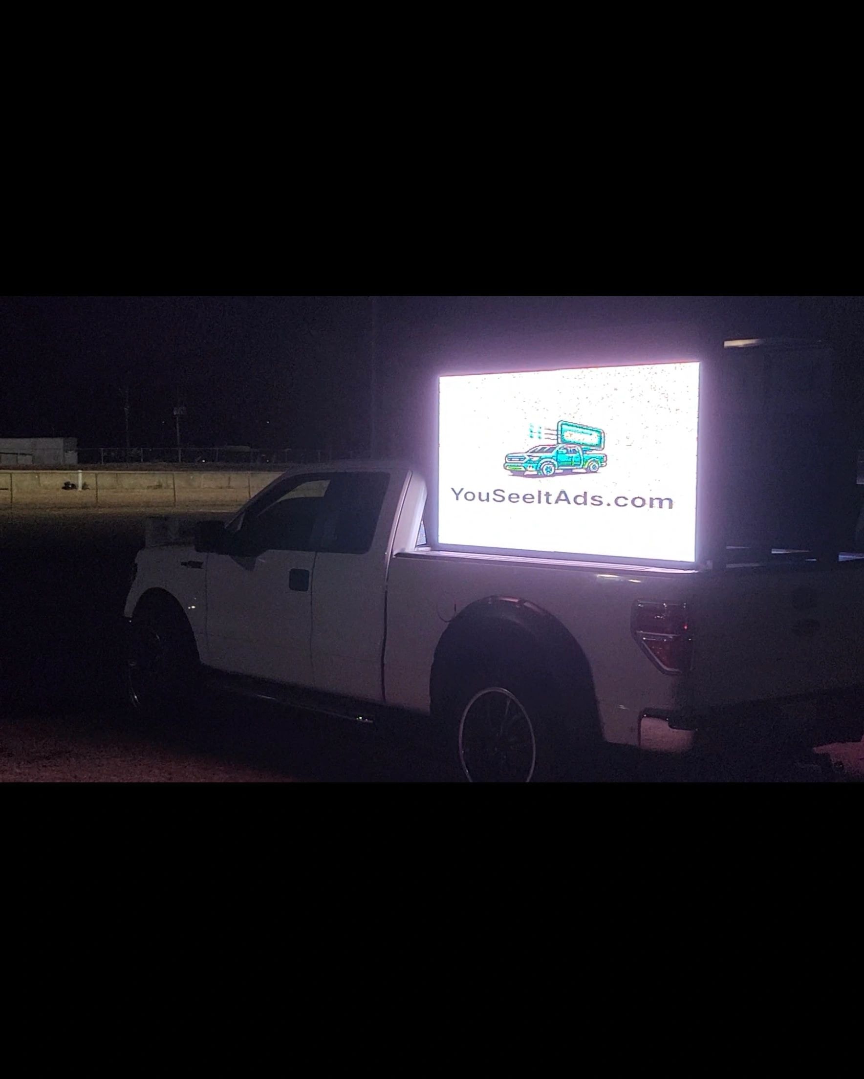YouSeeItAds LED billboard truck at night in Raleigh NC