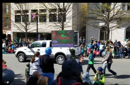 YouSeeItAds LED billboard truck at St. Patrick's Day parade